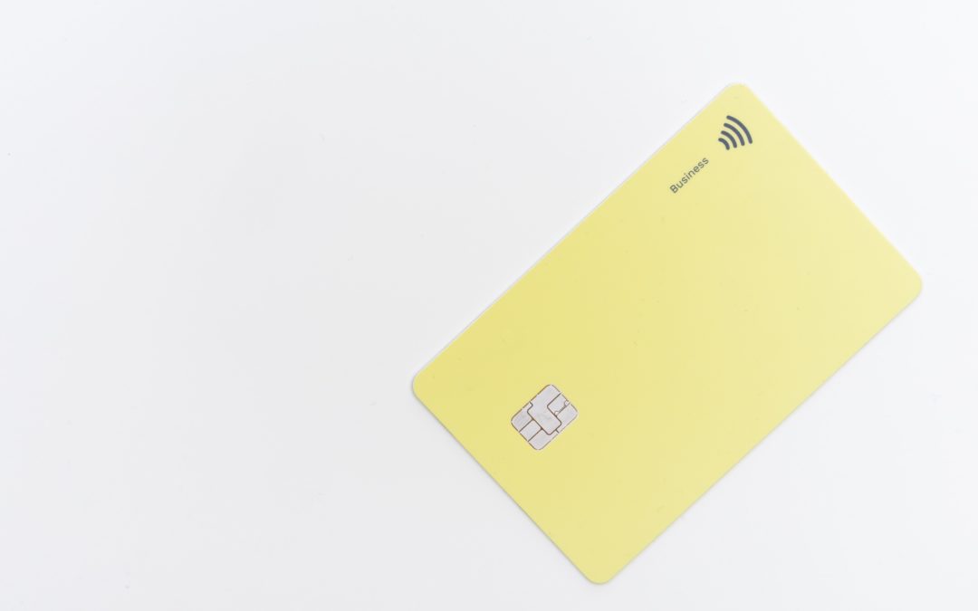 yellow credit card on white background
